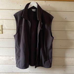 Dark gray zipper vest.